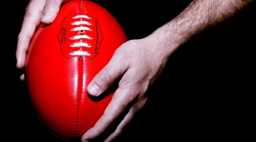 Parier sur le football australien : pourquoi ce sport attire de plus en plus les parieurs